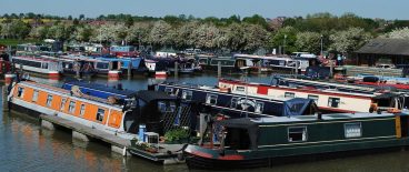 image of shipping barges in a marina