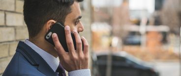 Image of man on cell phone