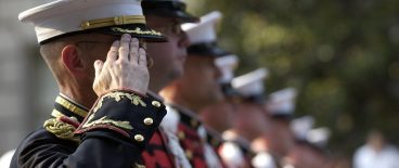 U.S. Marines saluting in formation