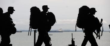 military marching with gear