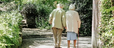 an elderly couple on a walk