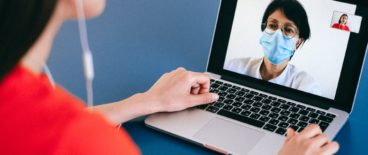 woman talking to doctor on laptop