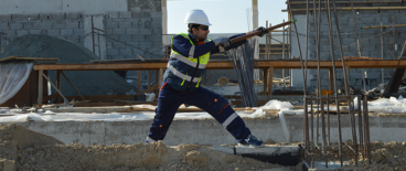 blue collar worker doing construction work