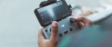 person operating a drone