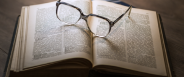 Book, reading glasses