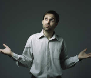 confused man in formal clothing shrugging