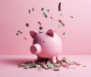 money falling into a piggy bank