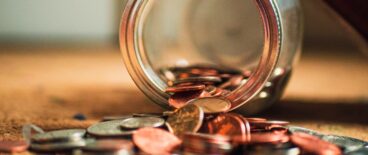 money spilling from a jar