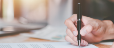 a person signing a document