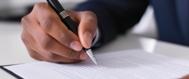 A person signing a contract