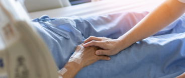 nurse taking care of an old person